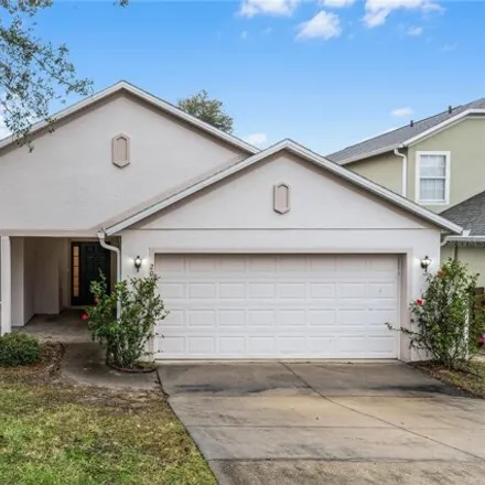 Rent this 3 bed house on 2067 Newtown Road in Groveland, FL 34736