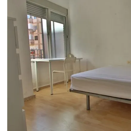Rent this 4 bed room on Carrer de Campoamor in 43, 46021 Valencia