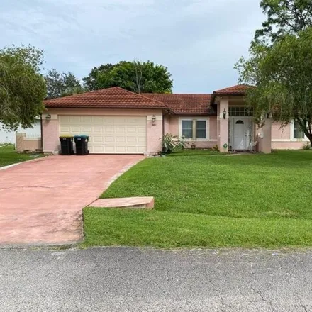 Buy this 3 bed house on 1467 Halstead Avenue Northwest in Palm Bay, FL 32907