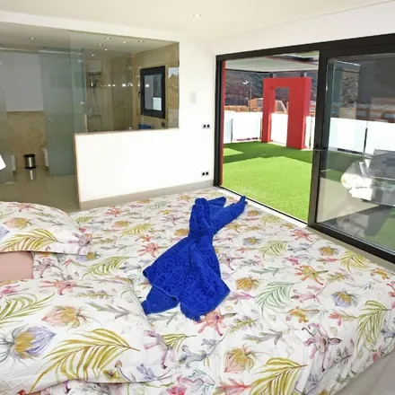 Rent this 4 bed house on Radisson Blu Resort & Spa Gran Canaria Mogán in Avenida Los Marrero, 35
