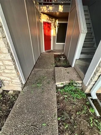 Rent this 2 bed condo on 3000 Timber Pass in Austin, TX 78741