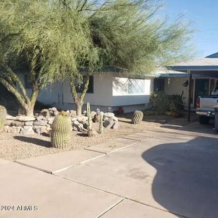 Buy this 4 bed house on 8631 East Thomas Road in Scottsdale, AZ 85251