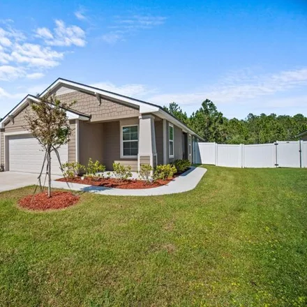 Buy this 4 bed house on Bucking Bronco Drive in Jacksonville, FL 32234