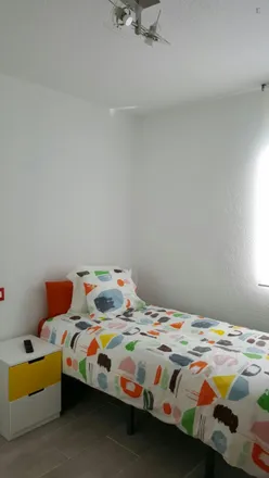 Rent this 4 bed room on Madrid in Calle Ernestina Manuel de Villena, 6