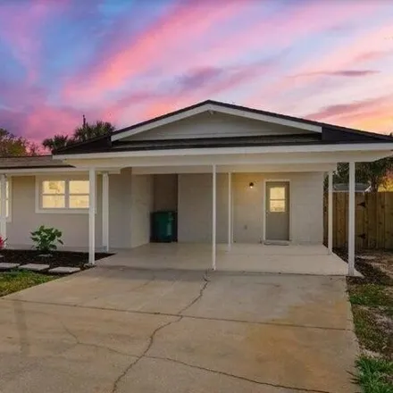 Buy this 4 bed house on 1599 Chub Street in Merritt Island, FL 32952