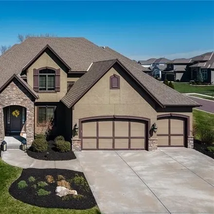 Buy this 6 bed house on 12401 West 164th Street in Overland Park, KS 66221