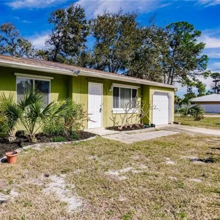 Buy this 2 bed house on 2492 Lakeshore Circle in Port Charlotte, FL 33952