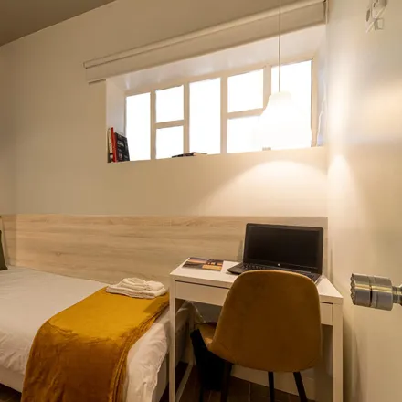 Rent this 4 bed room on Rua Paulo Dias de Novais in 1950-244 Lisbon, Portugal