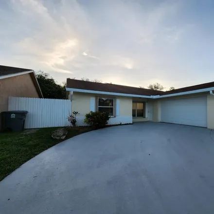 Buy this 3 bed house on 7302 Willow Spring Circle East in Palm Beach County, FL 33436