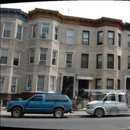 Buy this 8 bed townhouse on 457 60th Street in New York, NY 11220