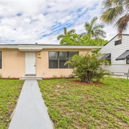 Buy this 3 bed house on 1211 S M St in Lake Worth, Florida