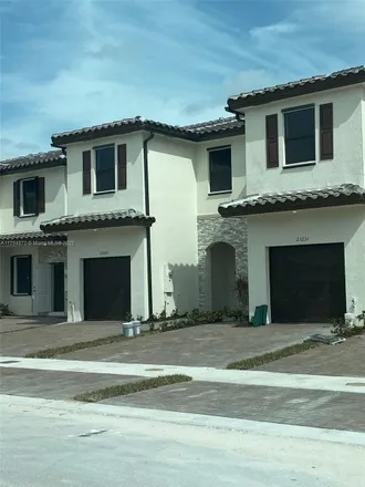 Rent this 3 bed townhouse on 23606 Southwest 111th Court in Naranja, Miami-Dade County