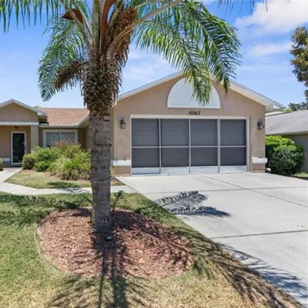Buy this 3 bed house on 10219 Velvetseed Circle in Spring Hill, FL 34608