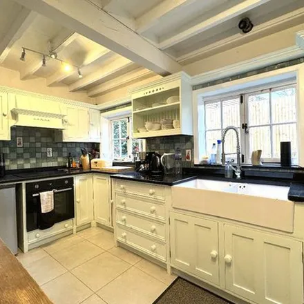 Rent this 3 bed townhouse on Cobham Bypass in Oxshott, KT11 1BG