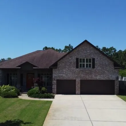Buy this 5 bed house on 2415 Whispering Pines Boulevard in Navarre, FL 32566