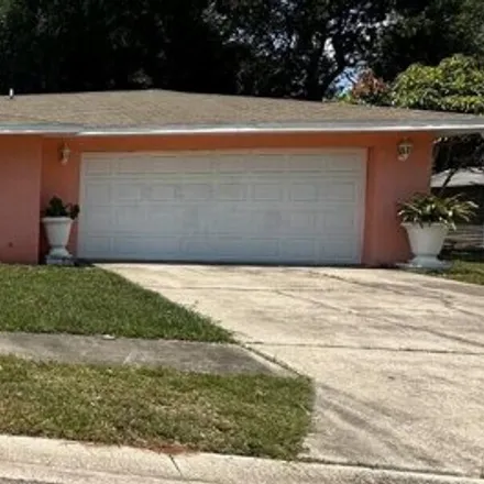 Rent this 3 bed house on 1278 Cora Avenue in Whispering Hills Golf Estates, Titusville