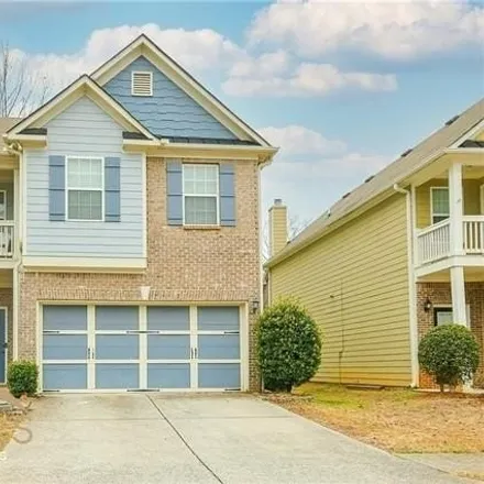 Rent this 4 bed house on 5220 Cedar Shoals Drive in Gwinnett County, GA 30519