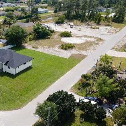 Buy this 4 bed house on 3425 30th Street Southwest in Lehigh Acres, FL 33976