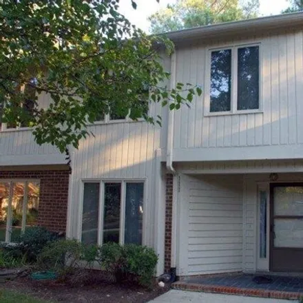 Rent this 2 bed townhouse on 111 Mossbark Lane in Chapel Hill, NC 27514