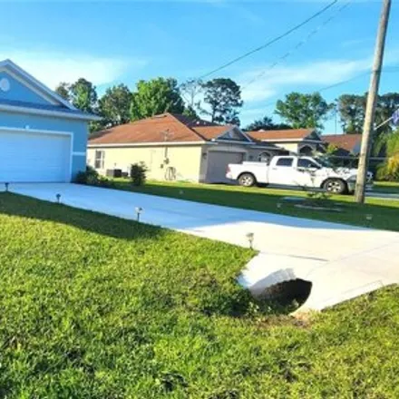 Buy this 3 bed house on 27 Powder Hill Lane in Palm Coast, FL 32164