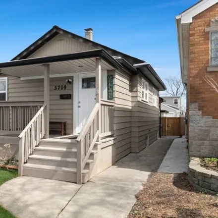 Buy this 3 bed house on 5709 North Mobile Avenue in Chicago, IL 60646