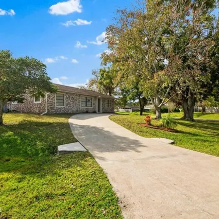 Buy this 3 bed house on 1591 Barton Avenue Northwest in Palm Bay, FL 32907