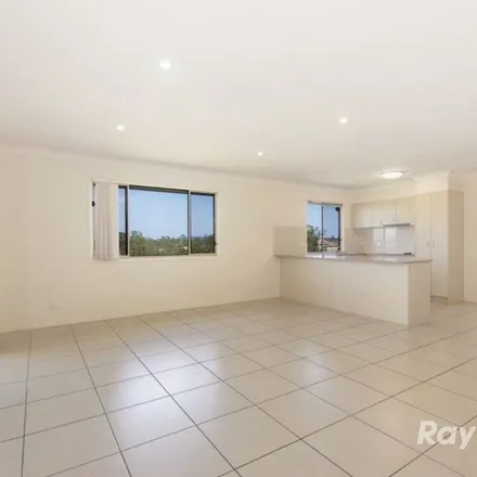 Rent this 4 bed apartment on Neptune Crescent in Brassall QLD 4305, Australia