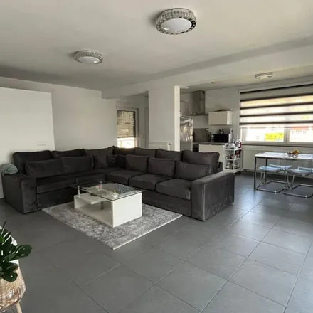 Rent this 2 bed apartment on Rue du Rond-Point 31 in 4420 Saint-Nicolas, Belgium