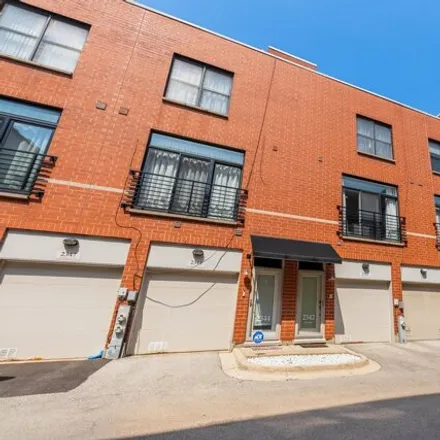 Buy this 2 bed townhouse on River Walk Lofts in 2336-2358 West River Loft Court, Chicago