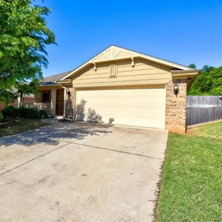 Buy this 3 bed house on 1711 Choctaw Wood Drive in Midwest City, OK 73020