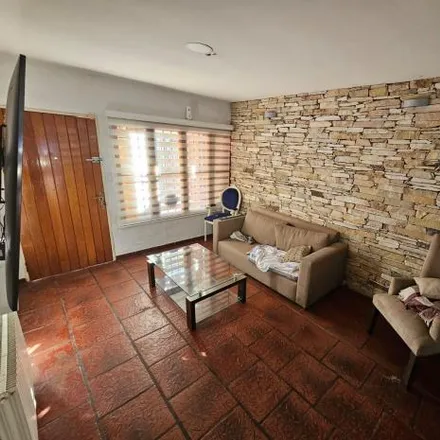 Buy this 4 bed house on 436 - Avenida La Plata 3961 in Partido de Tres de Febrero, B1676 BND Santos Lugares