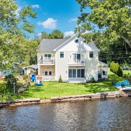 Buy this 4 bed house on 39 Clear Lake Road in Guilford, CT 06437
