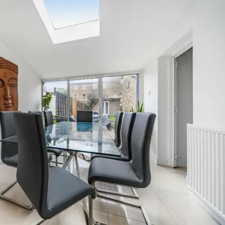 Rent this 4 bed townhouse on Spencer Hill Road in London, SW19 4EL