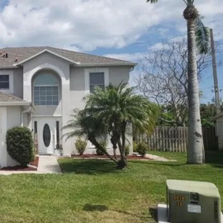 Buy this 4 bed house on 2238 Spring Creek Circle Northeast in Palm Bay, FL 32905