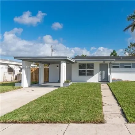 Rent this 4 bed house on 7585 Eaton Street in Hollywood, FL 33024