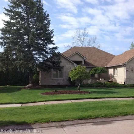 Buy this 3 bed house on 15708 Mountainside Drive in Macomb Township, MI 48042