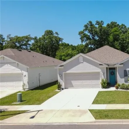 Buy this 4 bed house on 6086 Southwest 84th Street in Alachua County, FL 32608
