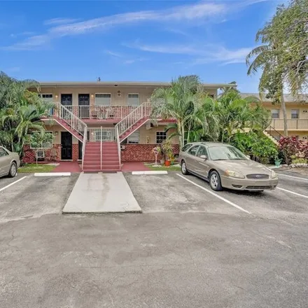 Buy this 15 bed house on Northeast 23rd Avenue in Pinehurst Village, Pompano Beach