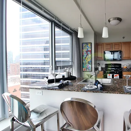 Rent this 2 bed condo on 244 N Canal