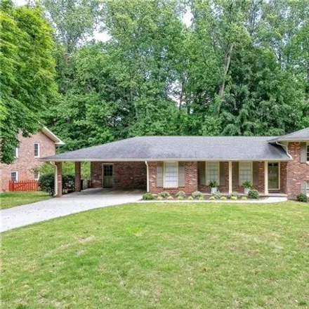Buy this 4 bed house on 4855 Mill Brook Drive in Dunwoody, GA 30338