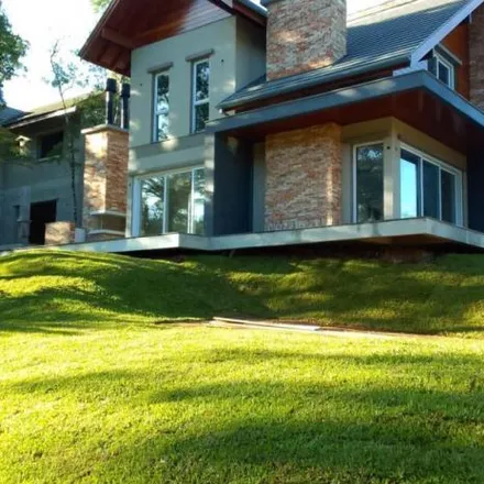 Buy this 4 bed house on unnamed road in Condomínio Vivendas do Arvoredo II, Gramado - RS