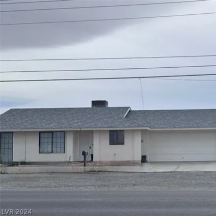 Rent this 2 bed house on 1317 East Calvada Boulevard in Pahrump, NV 89048