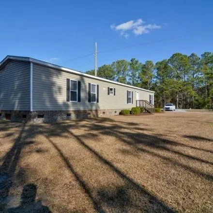 Buy this studio apartment on 1155 Clariday Road Southwest in Calabash, Brunswick County
