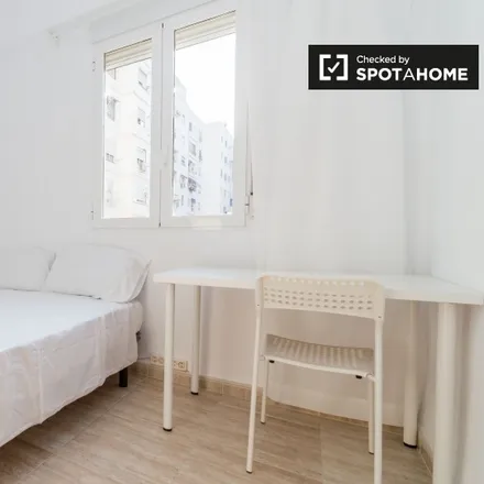 Rent this 6 bed room on Carrer d'Ernest Ferrer in 13, 46021 Valencia