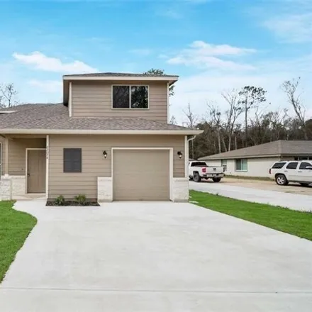 Rent this 4 bed house on 22104 Heatherwood Drive in Montgomery County, TX 77365