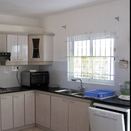 Rent this 3 bed condo on Flic en Flac in Black River, Mauritius