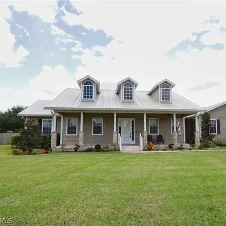 Rent this 3 bed house on 16680 Oak Grove Court in Alva, Lee County