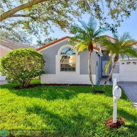 Buy this 3 bed house on 8400 Northwest 46th Drive in Whispering Woods, Coral Springs