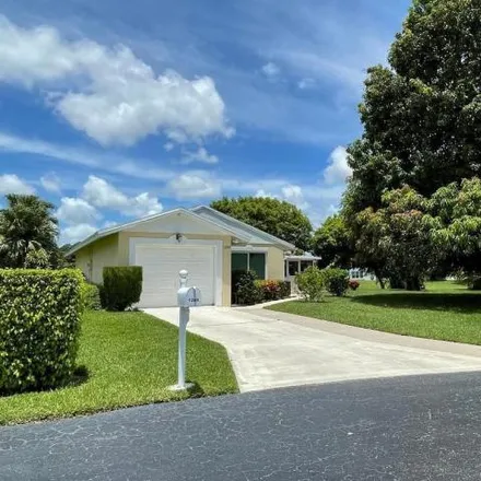 Buy this 2 bed house on Green Pine Boulevard in West Palm Beach, FL 33049