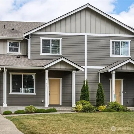Buy this 3 bed townhouse on 4201 202nd Street Ct E in Spanaway, Washington